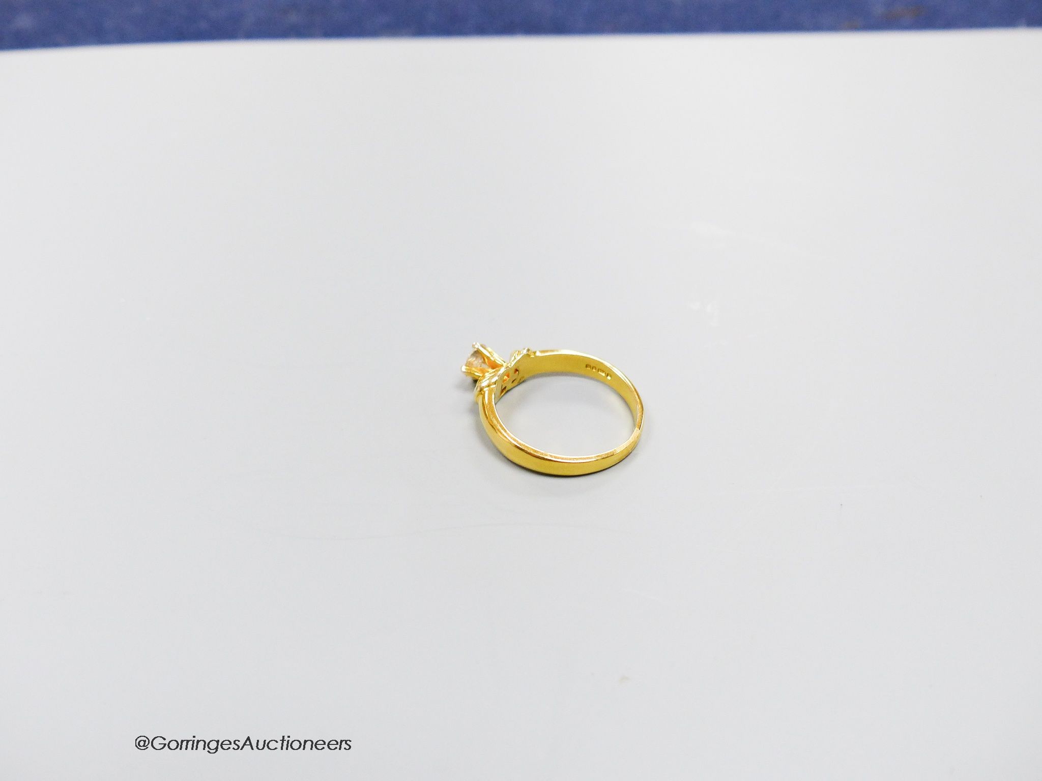 A 14k gold solitaire diamond ring, approx. 0.33ct, size L, gross 3g.